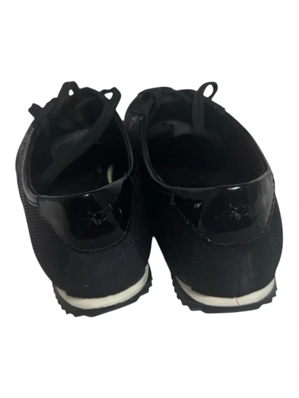Coach sleek black